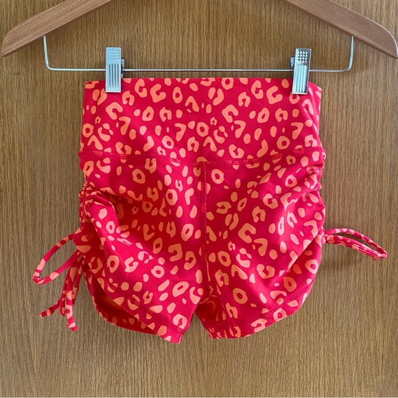 MUSCLE NATION • Signature Scrunch Tie Up Booty Shorts Red Cheetah Pattern - S - Picture 3 of 16